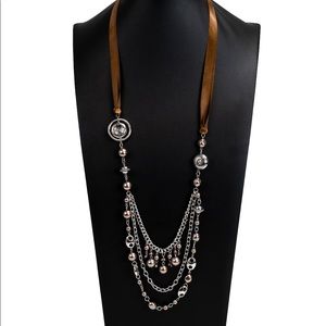 COPY - NWT A silky brown ribbon replaces a traditional chain to give an elegant…